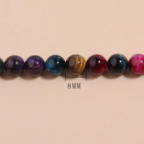 Vista 3 de Cuentas redondas sueltas de ojo de tigre natural de 0.315 pulgadas (0.315 in) con poder curativo para hacer joyas, pulseras y collares