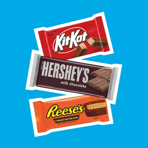 Vista 7 de HERSHEY'S, KIT KAT and REESE'S - Caja variada de dulces de chocolate con leche, 27.3 onzas (18 unidades)