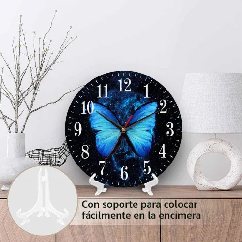 Vista 3 de Mxocom Reloj de pared de mariposa azul con grandes alas, mariposa volando a través del cielo estrellado, reloj silencioso sin tictac de 10 pulgadas