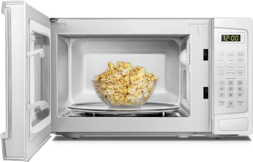 Vista 3 de Danby DBMW1120BWW - Microondas para encimera de 1.1 pies cúbicos en blanco, 1000 vatios, microondas de tamaño familiar con puerta de botón