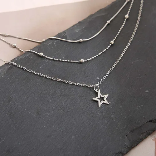 Vista 4 de YienDoo Gargantilla de estrella bohemia en capas, collar con dije de estrella plateada, collar de cuentas de satélite, gargantilla vintage