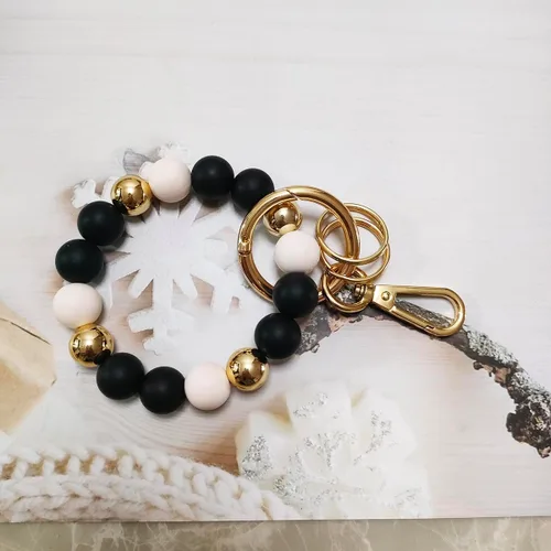 Vista 4 de Llavero de silicona con cuentas para mujer, pulsera elástica para llavero