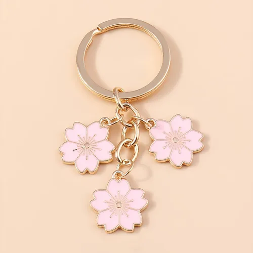 Vista 7 de Homvog 4 llaveros de flores lindos para mujer, llaveros de flores, dijes de borlas, colgantes esmaltados, llavero de borla, regalo de cartera