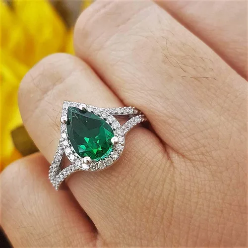 Vista 58 de Dazzlingrock Collection Anillo de compromiso con forma de lágrima y diamante blanco natural redondo de 0.45 quilates con halo de diamantes blancos