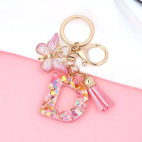 Vista 3 de Llavero de Letra Inicial del Alfabeto de Moda con Borla y Colgante de Mariposa, Anillo de Llaves para Bolso, Carteras, Mujeres y Niñas