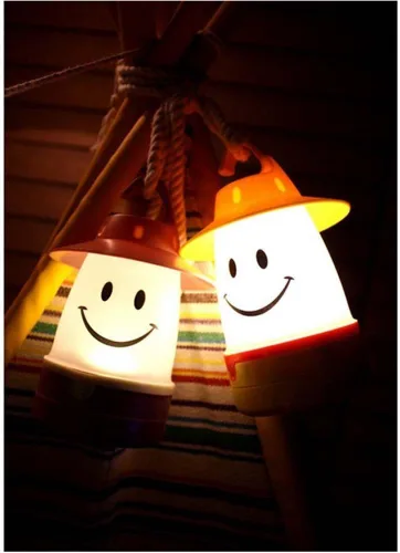Vista 2 de Linterna LED de sonrisa: linterna de camping nocturna portátil para niños (Diente de león)