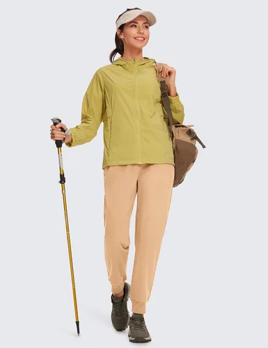 Vista 2 de CRZ YOGA Pantalones deportivos para mujer, impermeables, para exteriores, golf, atléticos, ligeros, con bolsillos con cremallera, de 27 pulgadas