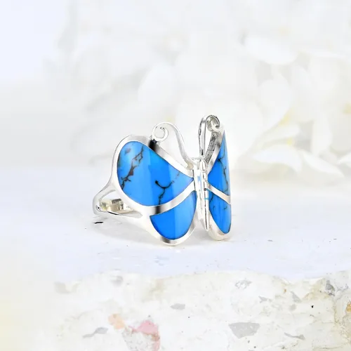 Vista 2 de Anillo de plata de ley 925 con diseño de mariposa y turquesa azul simulado.