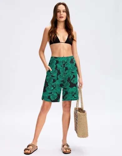 Vista 6 de Viodia Pantalones cortos de natación para mujer de 9 pulgadas de largo con bolsillos, cintura alta, trajes de baño de playa, hasta la rodilla