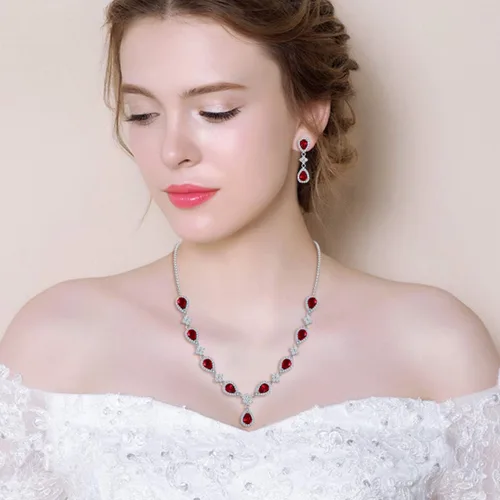 Vista 2 de EleQueen, juego nupcial de collar en V, pulsera tenis y aretes colgantes, con circonia cúbica, flor y lágrima, tono plateado, para mujer
