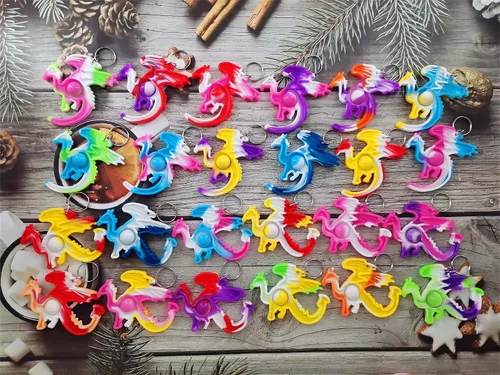 Vista 3 de Paquete de 24 mini juguetes sensoriales de dragón a granel, regalo para niños y niñas, regalos de fiesta y premio para estudiantes en el aula