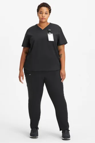 Vista 2 de Fabletics MotionTech - Pantalón médico de rendimiento para mujer, elástico en 4 direcciones, con bolsillos, resistente a las arrugas, ajuste