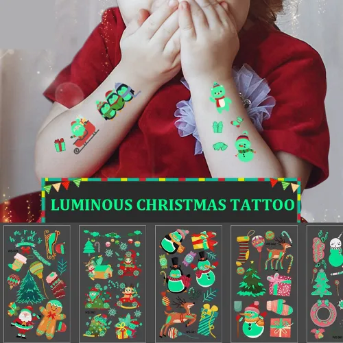 Vista 3 de Tatuajes de Navidad para niños, tatuajes temporales luminosos, 400 calcomanías impermeables de Navidad, tatuajes falsos que brillan en la oscuridad