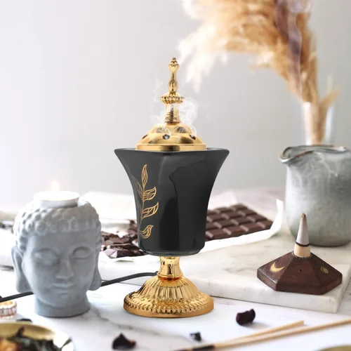 Vista 3 de VOSAREA Quemador de incienso eléctrico de estilo árabe, quemador de incienso eléctrico de mesa, incensario decorativo de mesa para incienso de Negro