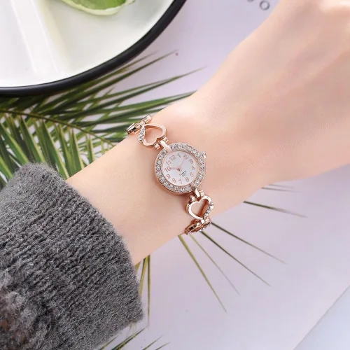 Vista 2 de ADSBIAOYE Reloj de pulsera de diamantes de lujo para mujer - Elegante correa de acero inoxidable hueco formal
