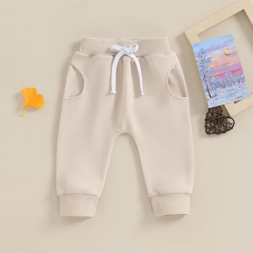 Vista 3 de Mubineo Pantalones deportivos básicos lisos para bebés, niños y niñas, cómodos pantalones de algodón con bolsillos