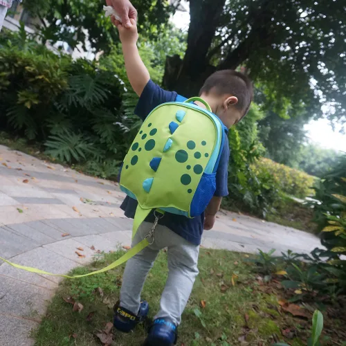 Vista 2 de Yodo, Bolsa para almuerzo aislada y mochila preescolar infantil, con correa de arnés de seguridad para niños o niñas, Dinosaur