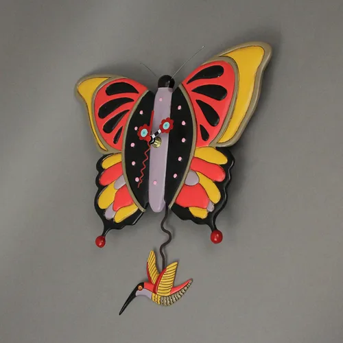 Vista 2 de Allen Designs Enesco Flutterby - Reloj de pared con péndulo esculpido con mariposa y colibrí, 13 pulgadas, multicolor