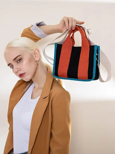 Vista 2 de Jeelow Bolso de lona para el hombro bolso cruzado para hombres y mujeres con cremallera y bolsillos