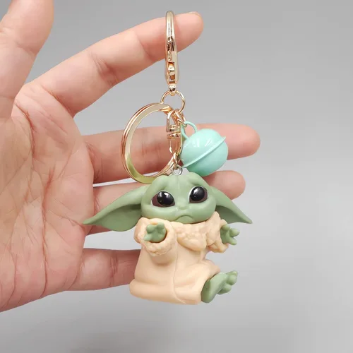 Vista 2 de Zmioviq Bonito llavero para hombres y niños, colgante de dibujos animados con campana pequeña, mochila de moda para decoración de automóvil