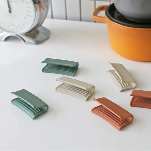 Vista 7 de Carrotez - Agarraderas de silicona para ollas, cubiertas de mango resistentes al calor para la cocina, accesorios para ollas holandesas de hierro