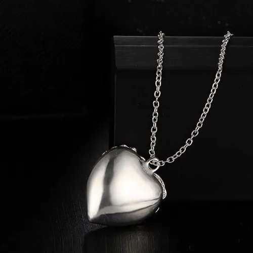 Vista 4 de Collar de gargantilla con colgante de cristal de corazón hueco para mujer brilla en la oscuridad otro
