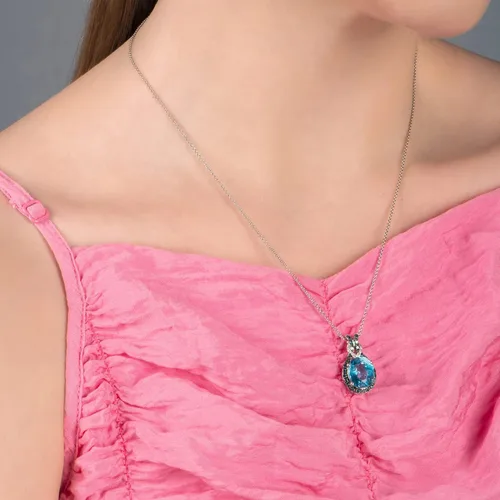 Vista 5 de Collar con pendiente de lazo ovalado de topacio azul con diamantes blancos y azules, 18