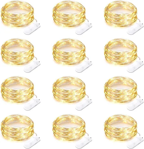 Vista 11 de Paquete de 12 luces de Halloween moradas que funcionan con pilas, luces de cadena de 7 pies, 20 luces LED de hadas, luces mini impermeables, cable