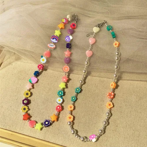 Vista 8 de 200 cuentas de arcilla polimérica de flores, cuentas espaciadoras de flores mixtas para hacer pulseras, collares, joyas