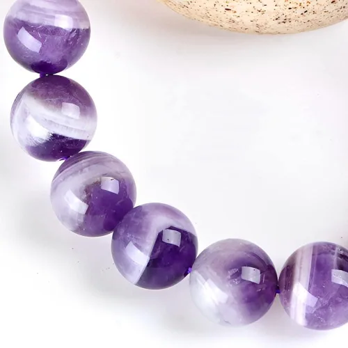 Vista 4 de OLARCU Pulsera elástica ajustable unisex con cuentas de cristal de amatista y poder curativo natural de 7 pulgadas, unisex.