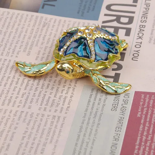 Vista 3 de Caja de joyería decorativa con bisagras en forma de tortuga marina, con figura de estrella de mar