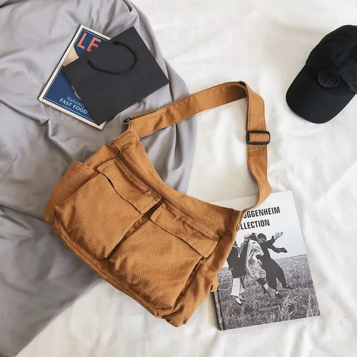 Vista 2 de Bolso bandolera grande de lona para mujeres y hombres, bolso de mano tipo mensajero para laptop, trabajo, universidad, viajes