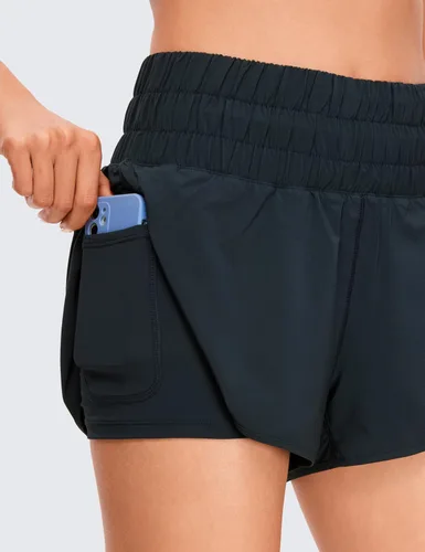 Vista 5 de CRZ YOGA Pantalones cortos de correr 2 en 1 para mujer de 3 pulgadas, cintura alta, entrenamiento, atletismo, gimnasio, tenis, con bolsillo