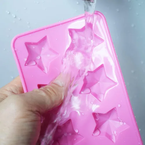 Vista 7 de Molde de chocolate con estrella, reutilizable de silicona de cinco puntas para hacer chocolates, cubitos de hielo, gelatinas y dulces (rosa)