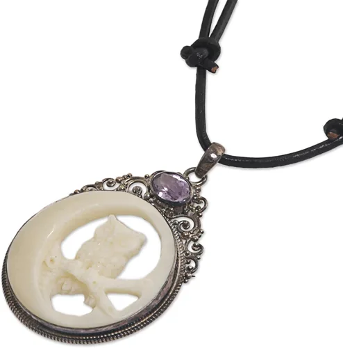 Vista 3 de NOVICA Collar con colgante de hueso de amatista hecho a mano artesanal, plata de ley 925, cuero de Indonesia, piedra natal con temática de animales
