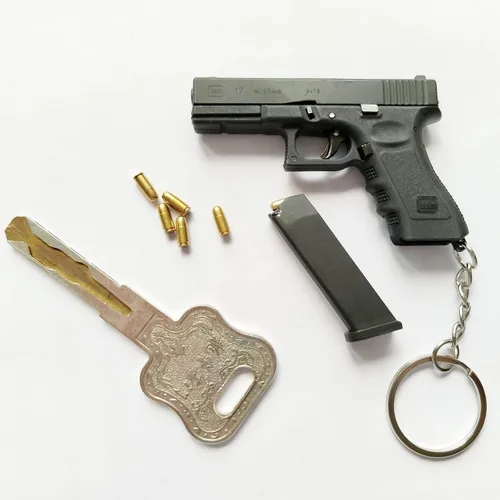Vista 3 de Mini llavero de pistola, llavero con forma de pistola, llavero táctico pequeño con forma de pistola, regalo con colgante en forma de armas, llaveros