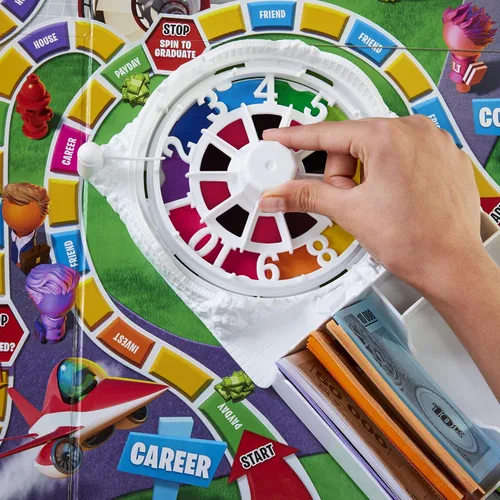 Vista 13 de Juego de mesa The Game of Life, juegos familiares para niños de 8 años en adelante, las clavijas vienen en 6 colores, juegos de mesa familiares