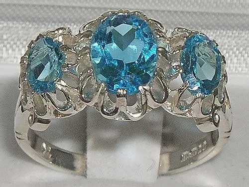 Vista 2 de Anillo de plata de ley 925 con topacio azul auténtico para mujer