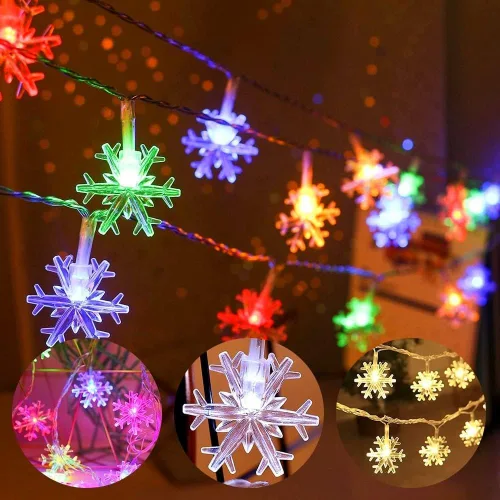 Vista 2 de AUAUY Guirnalda de luces de copos de nieve, 40 luces LED de 19.6 pies, funciona con pilas, 2 modos, luces impermeables para exteriores, interiores