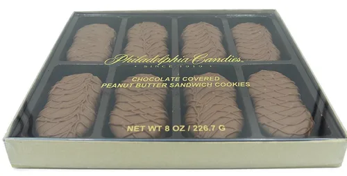 Vista 15 de Galletas de la marca Philadelphia Candies cubiertos por ambos lados de chocolate negro y con leche, y crema de cacahuete de la marca Nutter Butter