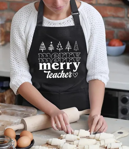 Vista 2 de TSIIUO Delantal de Feliz Profesor para mujer, divertido diseño de Navidad, impermeable, ajustable, con 2 bolsillos