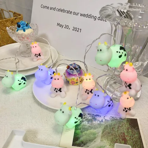 Vista 4 de Guirnalda de luces de vaca de Pascua de 5.4 pies, 10 luces LED de hadas de vaca de Navidad, funciona con pilas para decoración del hogar, fiesta