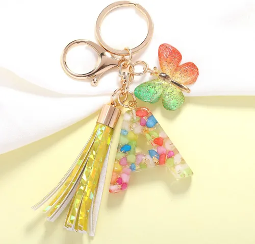 Vista 2 de OKAICEN Llavero con letra inicial del alfabeto, borla láser, colgante de mariposa degradado, llavero para bolso, bolsos y mujeres