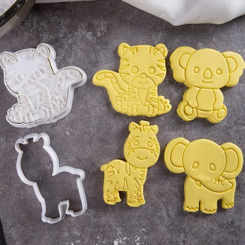 Vista 2 de Juego de 8 cortadores de galletas de animales con mango de sello 3D, diseño de selva para cocina, formas de pastel de ácido poliláctico