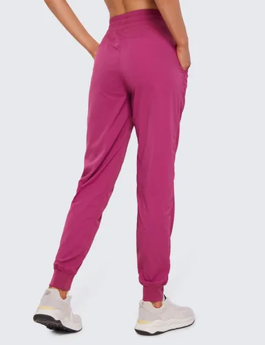 Vista 2 de CRZ YOGA Pantalones deportivos ligeros de entrenamiento para mujer, pantalones casuales de cintura alta para correr al aire libre con bolsillos