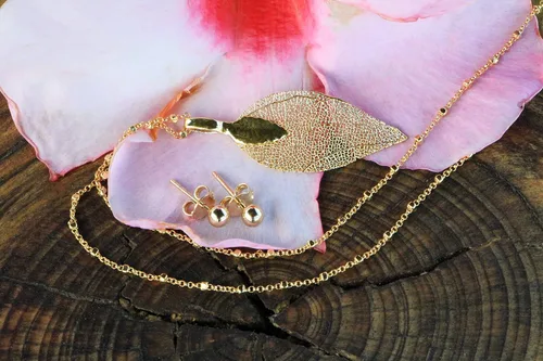 Vista 39 de Joyas de hoja de oro rosa y plata para mujer. Pendientes de hoja natural y collares circulares colgantes. Elegantes conjuntos de joyas colgantes.
