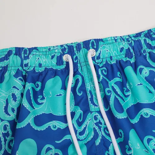 Vista 3 de Yuzhih Pantalones de playa para hombre, con gráficos irregulares, pantalones cortos ajustados con cintura elástica, pantalones cortos atléticos