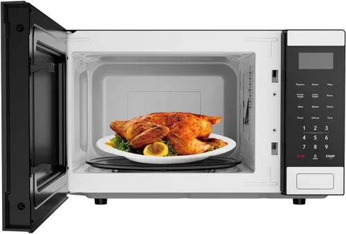 Vista 10 de Microondas Frigidaire de 0.9 pies cúbicos, panel de control digital - Configuraciones de cocción automática - Bloqueo de seguridad para niños