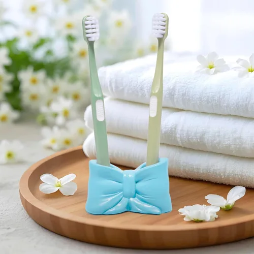 Vista 3 de Hodao Bowtie - Soporte para cepillos de dientes y bolígrafos para niños, bonito soporte de almacenamiento multifuncional de resina, organizador