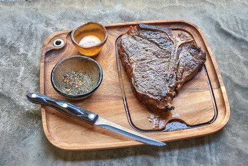 Vista 6 de Ironwood Gourmet Fort Worth Plato para Bistec con Canal para Jugos, Madera de Acacia, Juego de 4